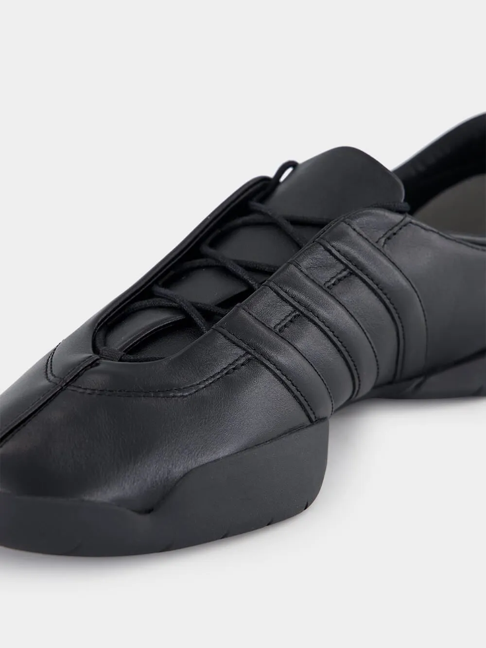 Black Low-Top Regu Sneakers