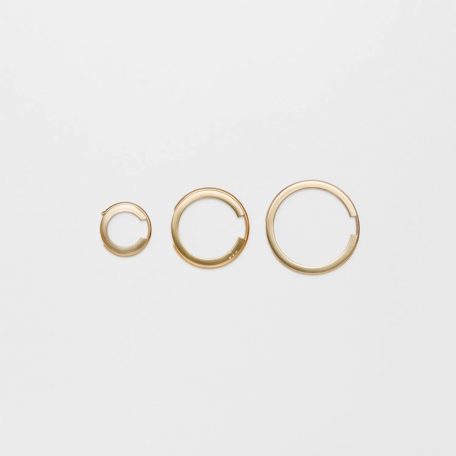 CO  gold hoop earring