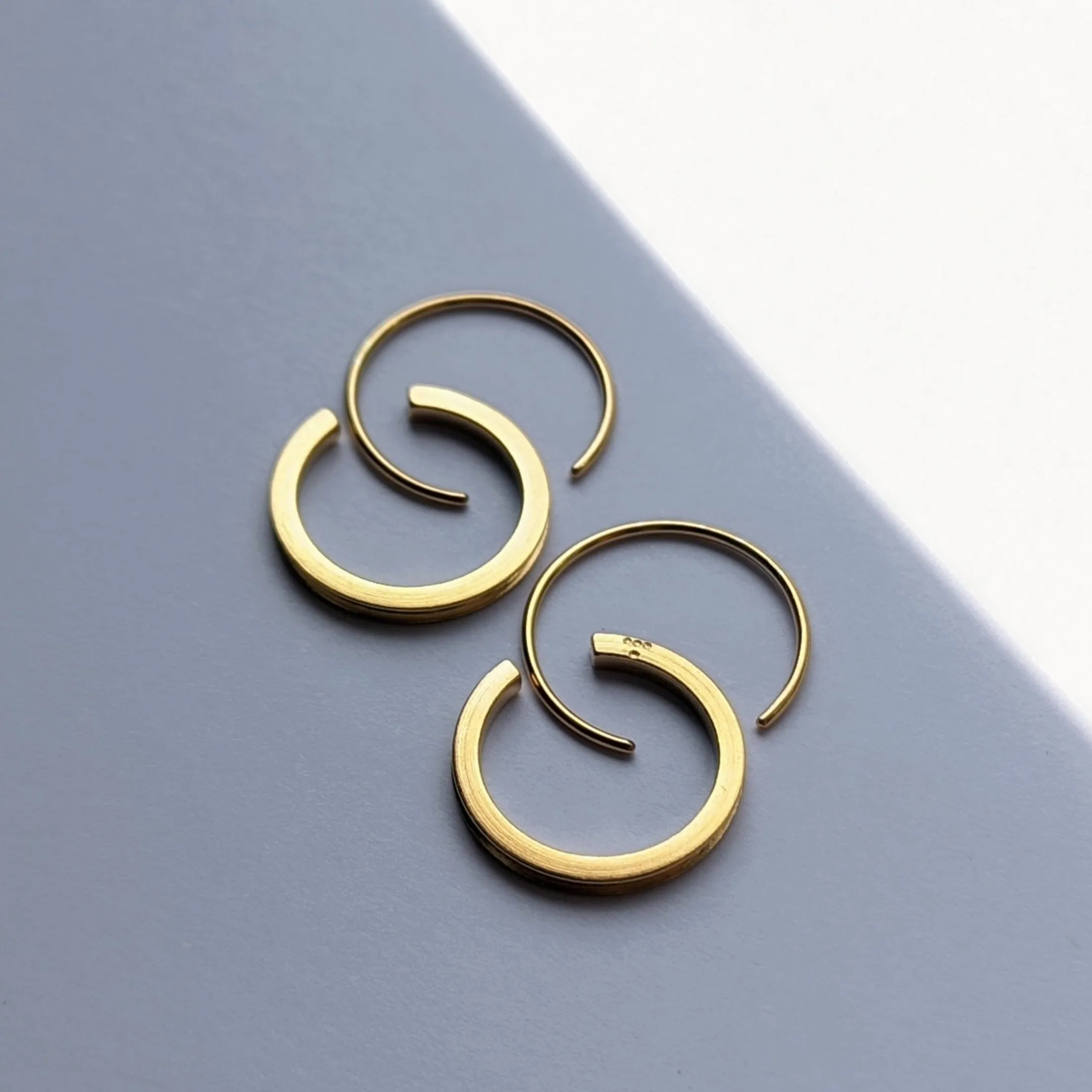 CO  gold hoop earring
