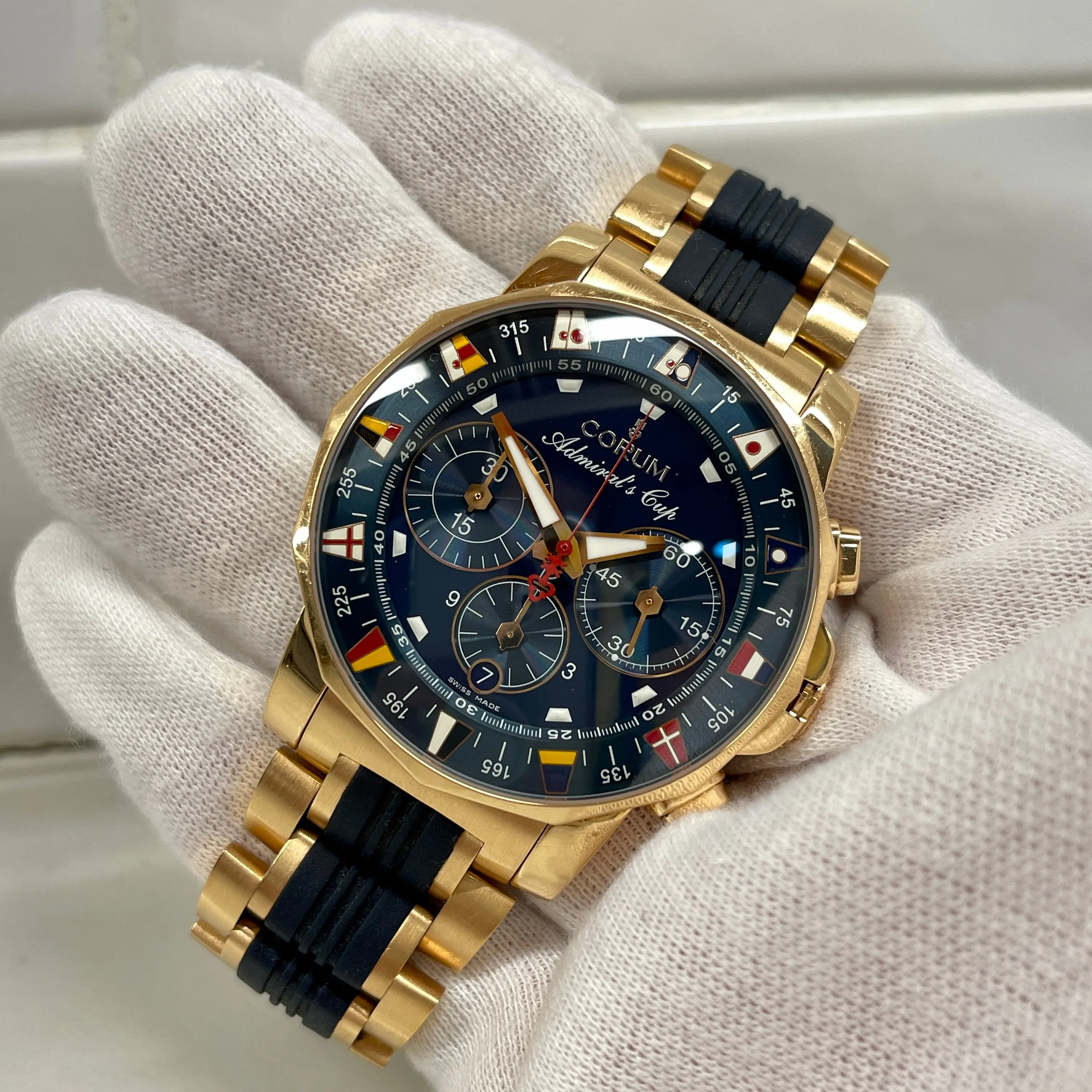 Corum Admiral's Cup Chronograph 44mm 18K Rose Gold Rubber Bracelet Blue Dial 985.673.55