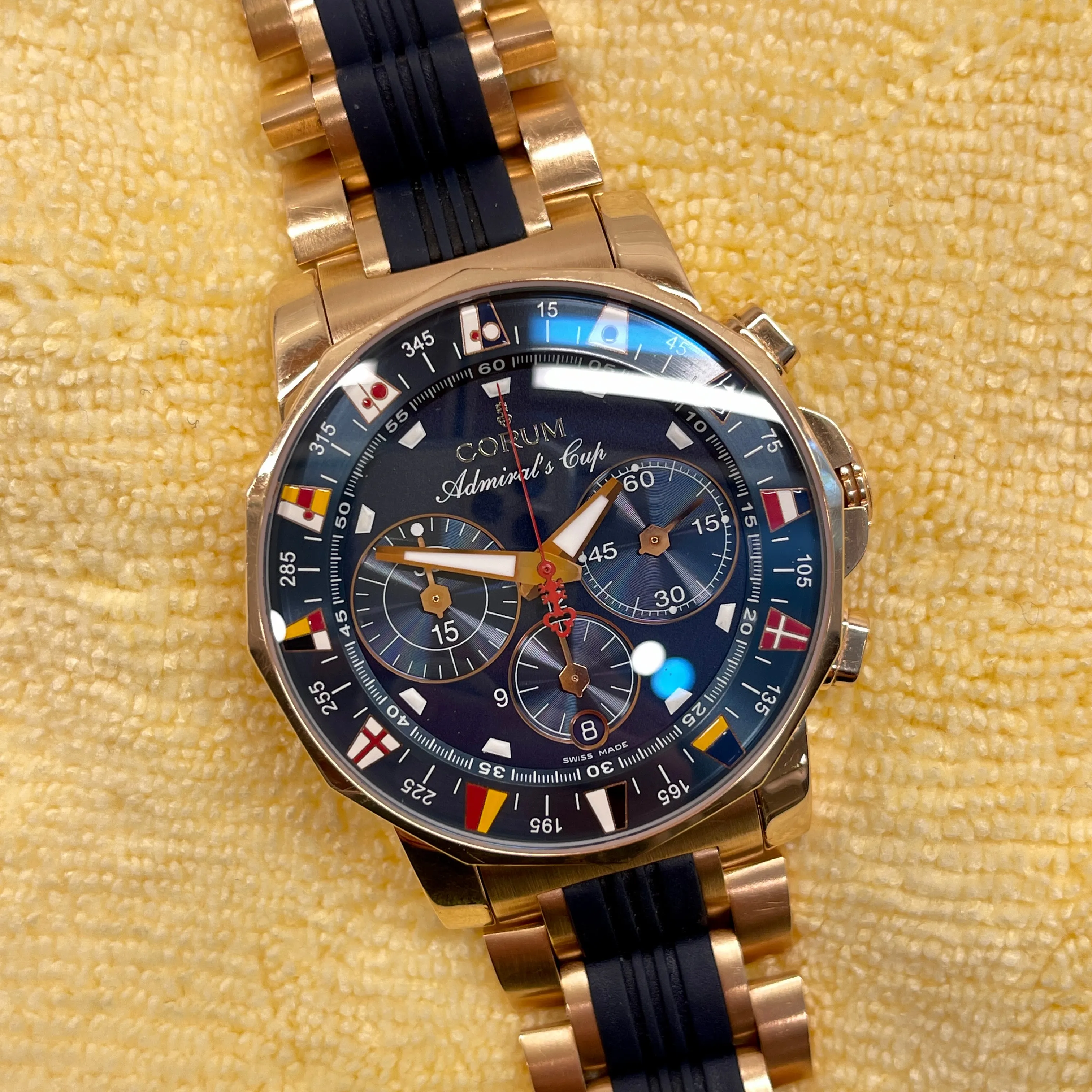 Corum Admiral's Cup Chronograph 44mm 18K Rose Gold Rubber Bracelet Blue Dial 985.673.55