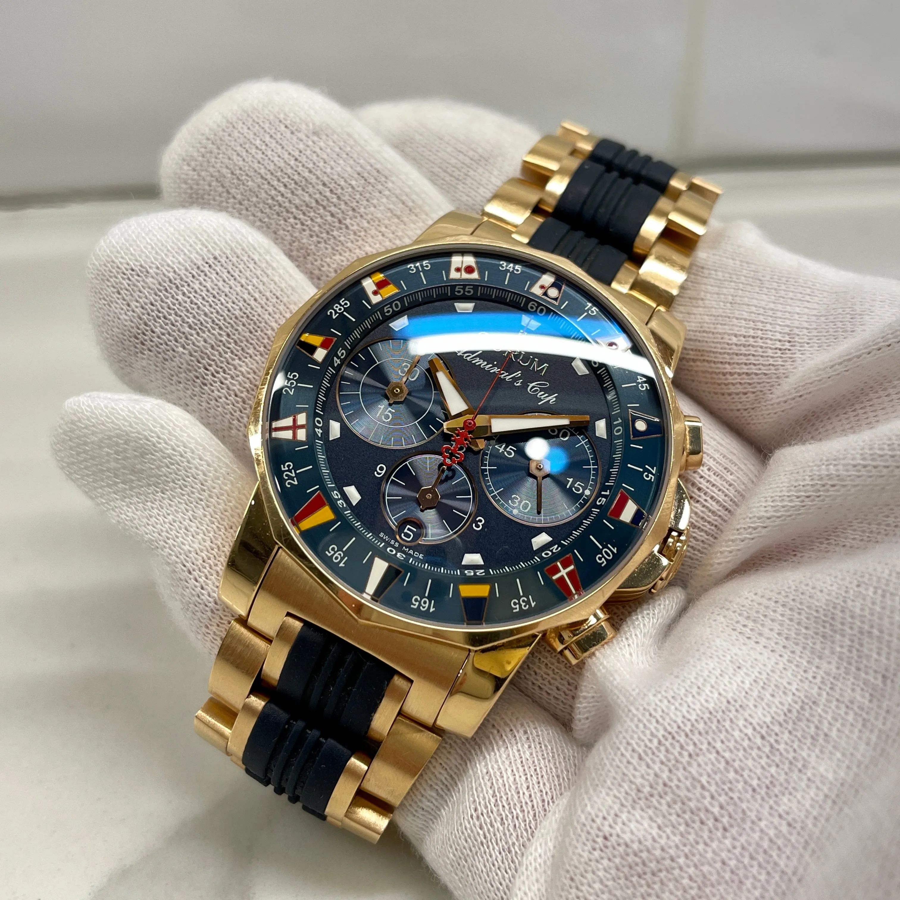 Corum Admiral's Cup Chronograph 44mm 18K Rose Gold Rubber Bracelet Blue Dial 985.673.55