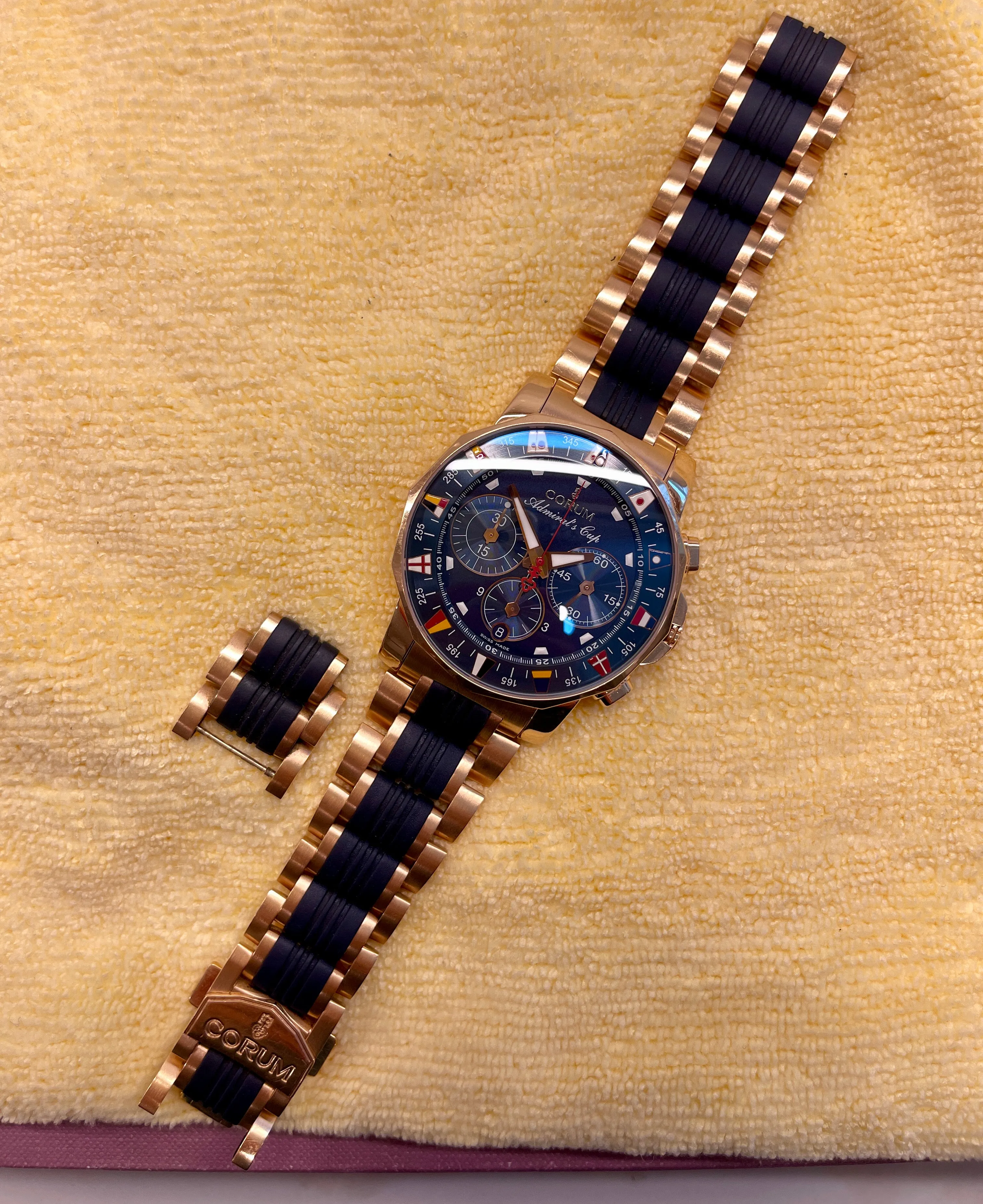 Corum Admiral's Cup Chronograph 44mm 18K Rose Gold Rubber Bracelet Blue Dial 985.673.55